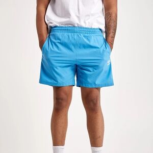 Adidas adicolor classic trace shorts in turquoise/aqua size M..USED